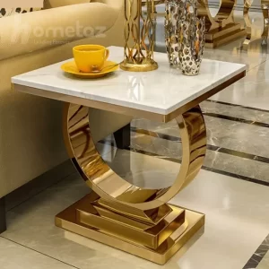 فروش انلاین میز عسلی مدرن با ورق استیل مدل زرتاج طلایی با صفحه هایگلاس سفید